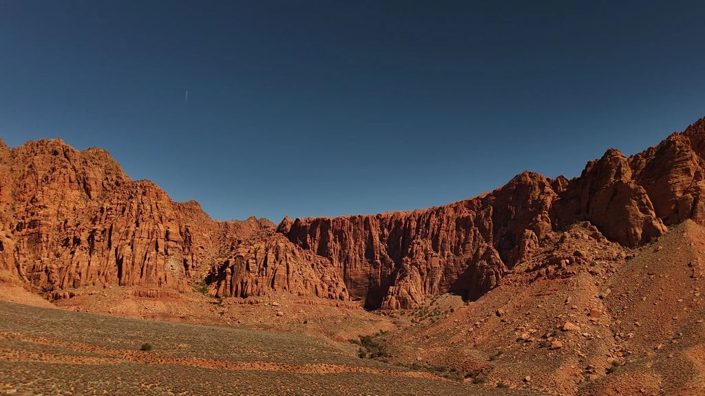 Red cliffs under a blue sky full of white clouds near Ivins, Utah